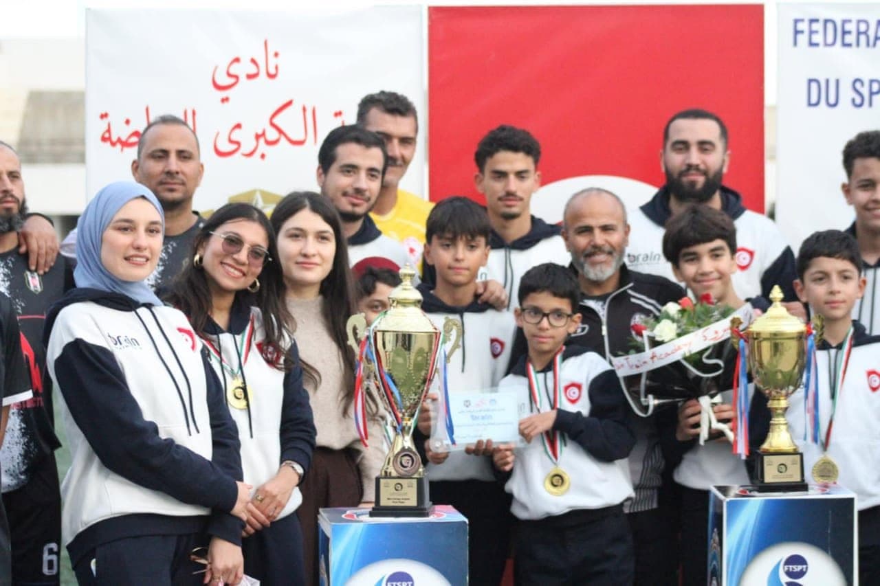 BrainTrain students celebrating with their competition trophies